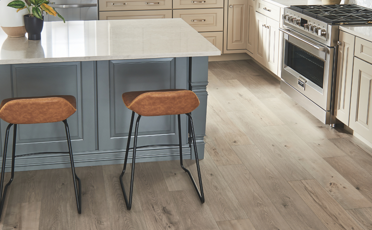 Laminate flooring in a kitchen with two barstools